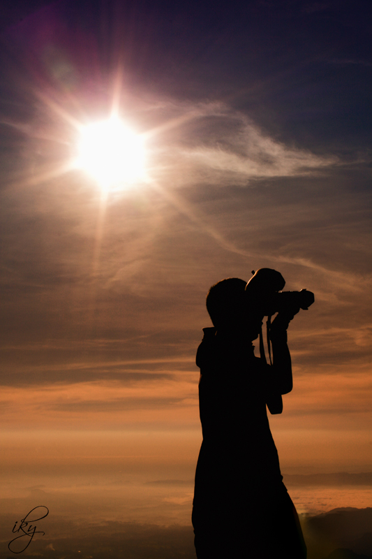 Photographer_silhouette_by_iky22