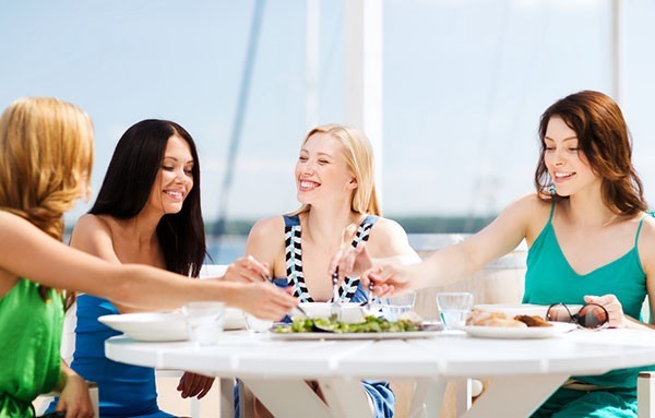 girls in cafe on the beach