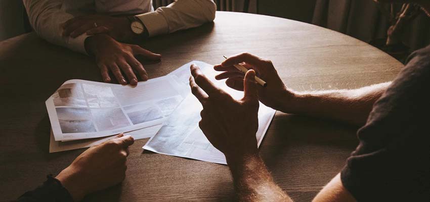 People reviewing documents