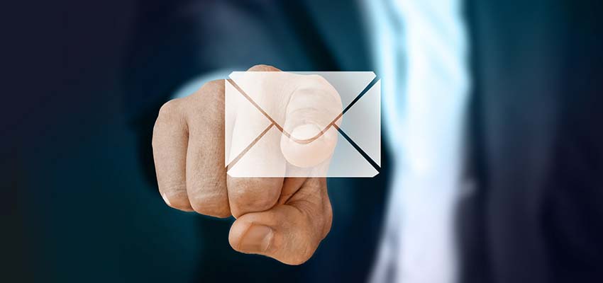 Hand Touching an Email Icon