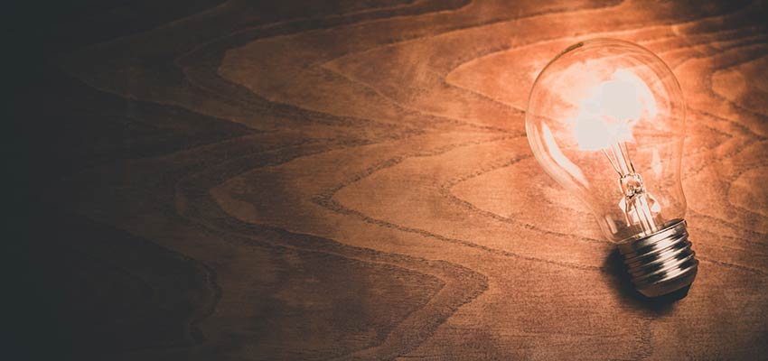 Lightbulb on a desk.