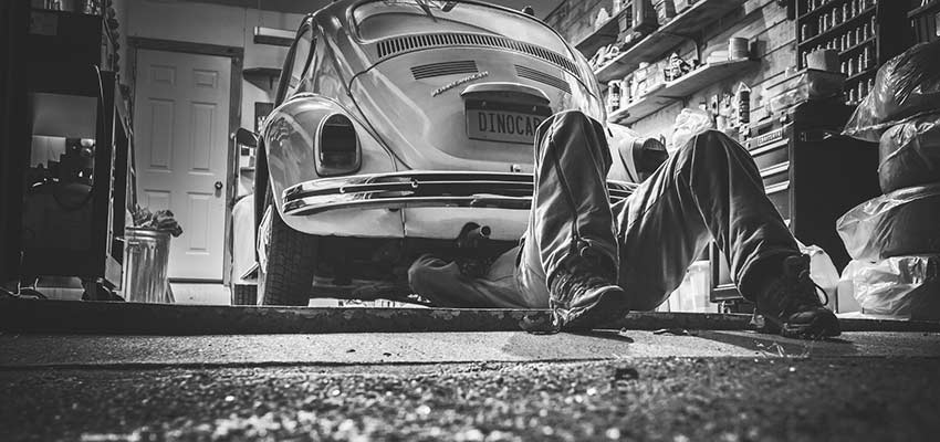 Mechanic repairing a car.